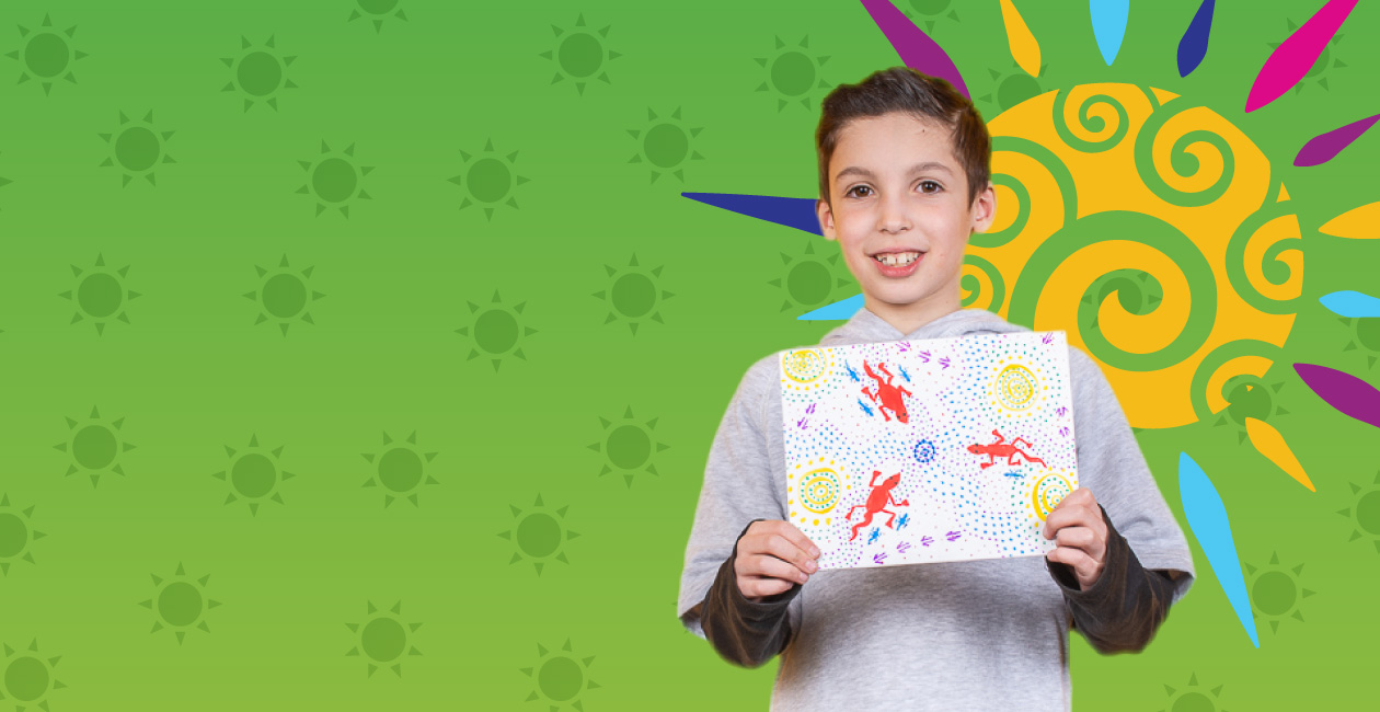 Boy holding a canvas with a red lizard after a Crayola Imagine Arts program. There is a colorful sun behind the boy